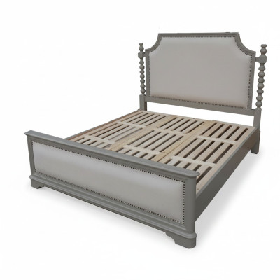 Elegant double bed with classic design and luxurious headboard