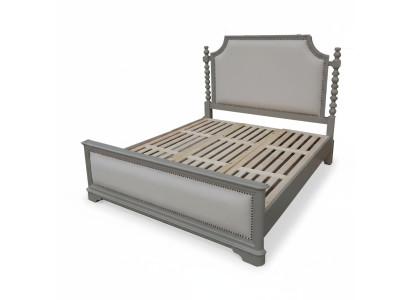 Elegant double bed with classic design and luxurious headboard
