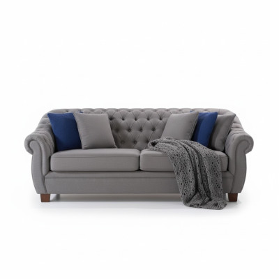 Chesterfield fabric upholstered three-seater living room couch textile design