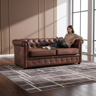 Luxurious Chesterfield sofa made of faux leather for the living room