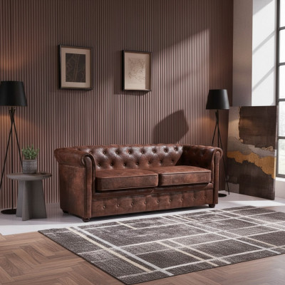 Luxurious Chesterfield sofa made of faux leather for the living room