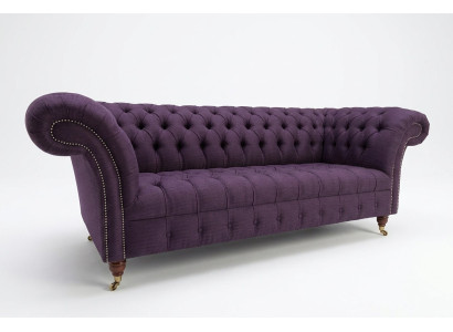 Modern purple Chesterfield three-seater living room sofa.