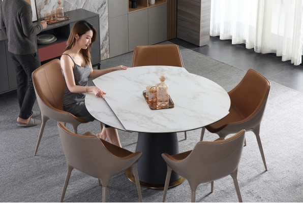 A stylish round dining table for your modern-style dining room.