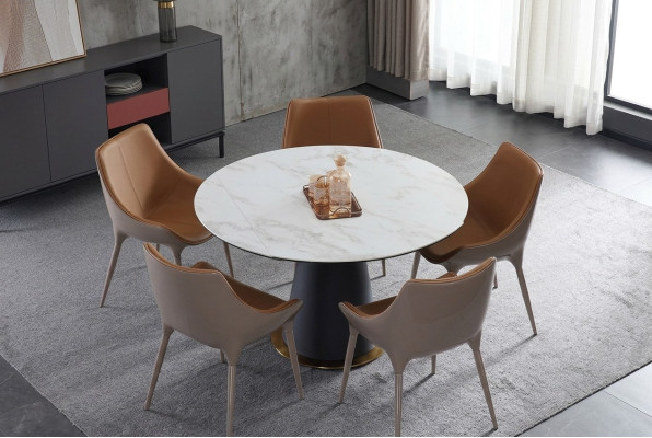 A stylish round dining table for your modern-style dining room.