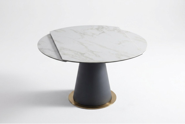 A stylish round dining table for your modern-style dining room.