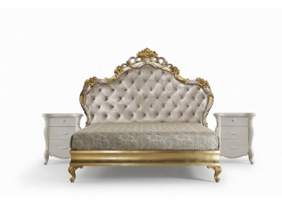 Beautiful bed in a classic style with a carved headboard.