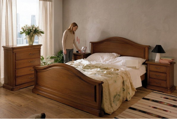Buy a large double bed in a classic, simple style made of natural wood.