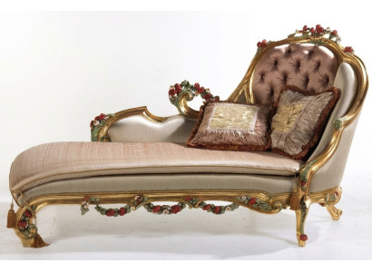 Luxurious chaise longue with decorative carvings