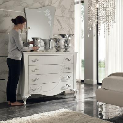 Dresser with mirror made of wood in a modern style for the bedroom
