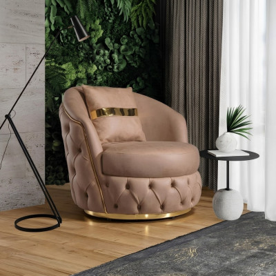 A luxurious, modern armchair in a light beige tone from Chesterfield