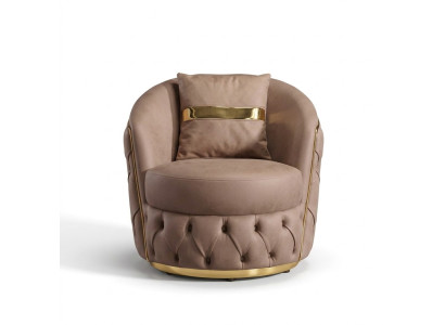 A luxurious, modern armchair in a light beige tone from Chesterfield