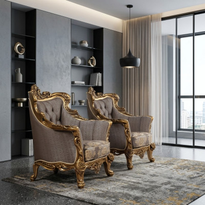 A luxurious classic wingback chair in dark gray with golden baroque design by Chesterfield