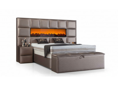 Elegant contemporary double bed with spacious upholstered headboard.