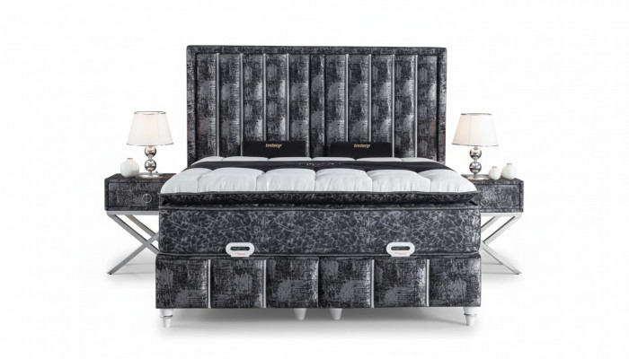 Black bed with mattress and two nightstands in the bedroom furniture set
