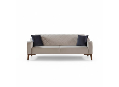 Beige three-seater couch elegant sofa living room seating velvet