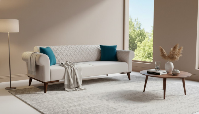 Beige three-seater couch elegant sofa seating living room velvet