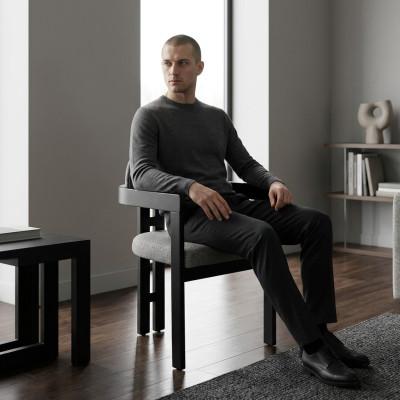 A state-of-the-art chair with an unusual shape and interesting legs with a comfortable gray-black backrest for the dining room.