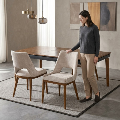A laconic, modern chair with high wooden legs and upholstery in a pleasant, light cream color for the dining room.