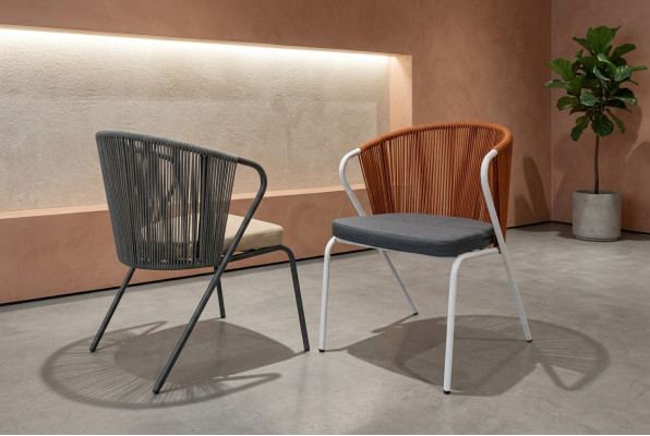 Original chairs in gray on black stainless steel legs with a soft cushion