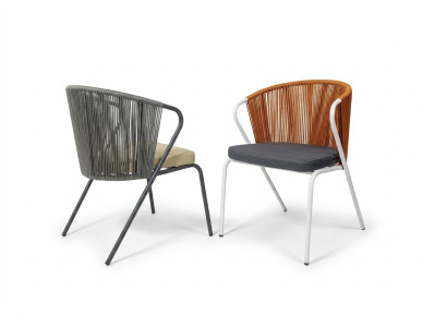 Original chairs in gray on black stainless steel legs with a soft cushion