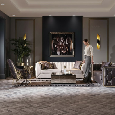 Modern three-seater sofa made of stainless steel