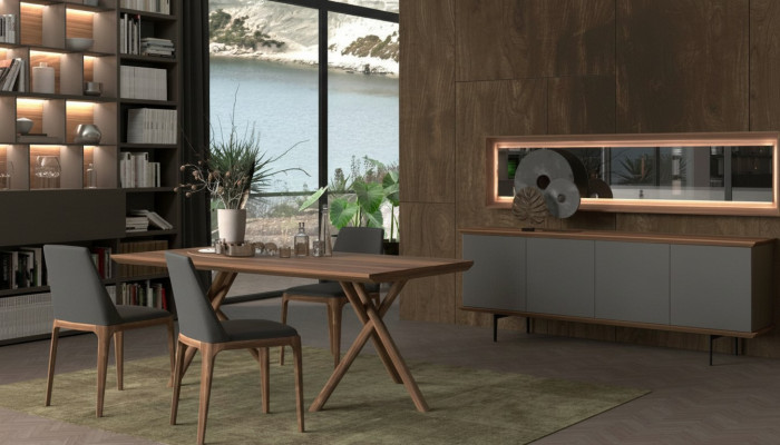 Luxury dining furniture with table, chairs, chest of drawers, and mirror