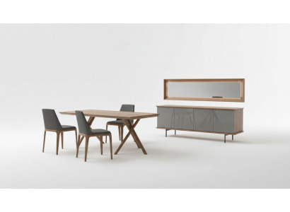 Luxury dining furniture with table, chairs, chest of drawers, and mirror