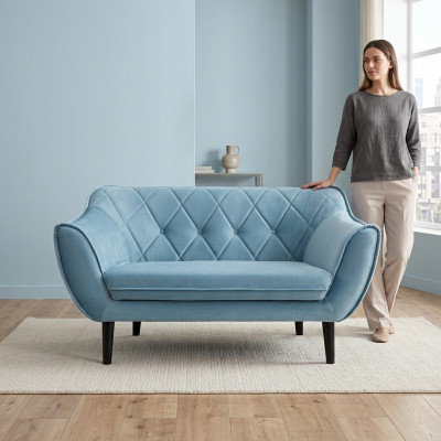 Comfortable, soft 2-seater sofa in luxurious upholstery in delicate blue color