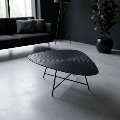 Stylish black coffee table for the living room with a carved tabletop