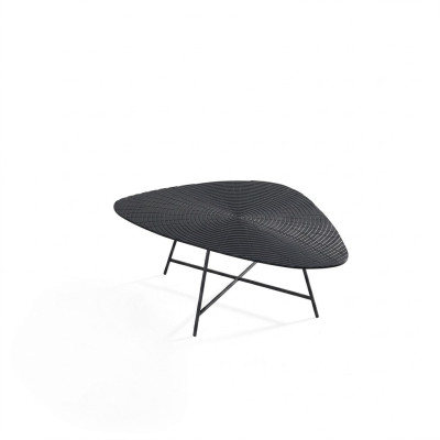 Stylish black coffee table for the living room with a carved tabletop