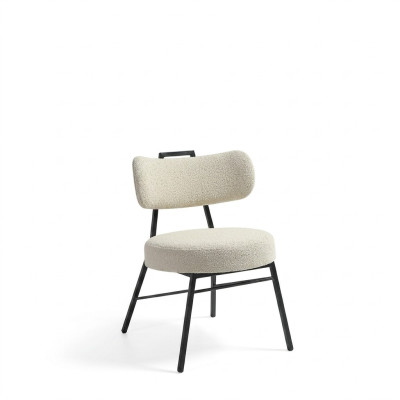 Luxurious designer chair made of wood with soft padding for the dining room