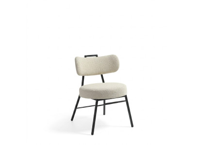 Luxurious designer chair made of wood with soft padding for the dining room