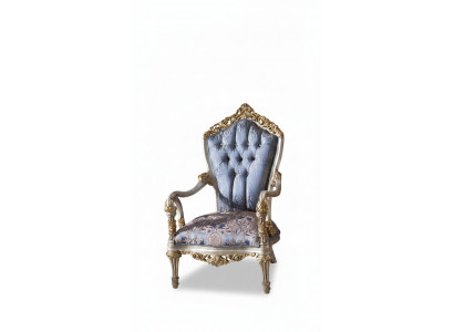 Luxurious armchair in classic style for the living room with golden decorative patterns