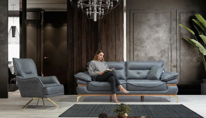 Modern designer gray living room with 3-seater sofa and new armchair