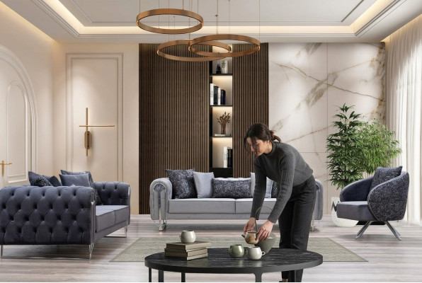 Modern comfortable living room furniture: two three-seater sofas and one armchair.