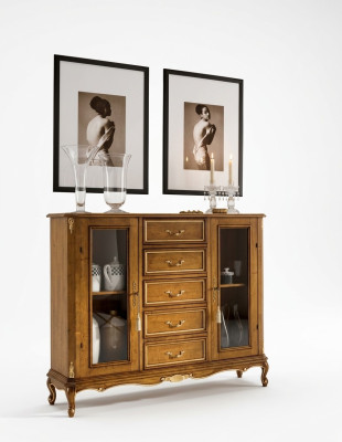 Exclusive brown wooden display cabinet with drawers in classic furniture style.