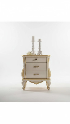 Modern designer nightstand made of white wood in the bedroom classic furniture