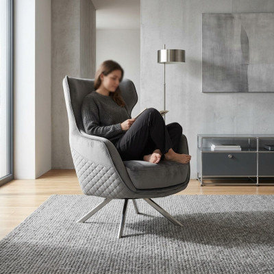 Innovative gray armchair, luxurious club chair, living room recliner.
