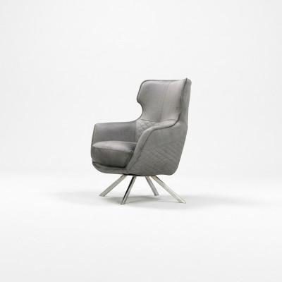 Innovative gray armchair, luxurious club chair, living room recliner.