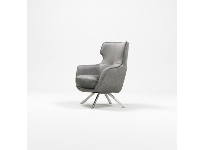 Innovative gray armchair, luxurious club chair, living room recliner.