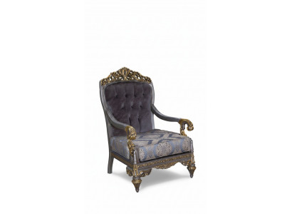 Elegant classic armchair with decorative patterns in Chesterfield design.