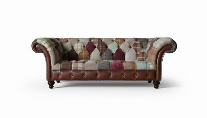 Colorful designer sofa in Chesterfield design with three seats
