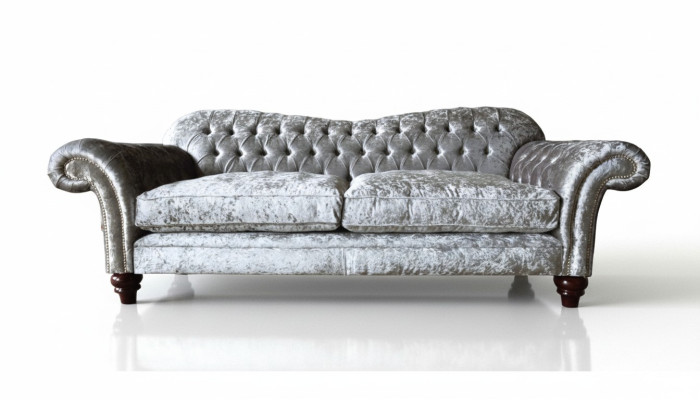 Luxurious classic gray three-seater Chesterfield sofa