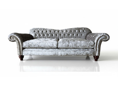 Luxurious classic gray three-seater Chesterfield sofa
