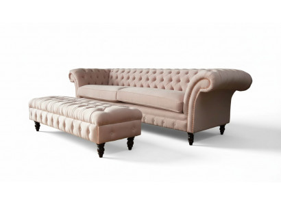 A luxurious pink four-seater sofa in Chesterfield design, including seat cushions