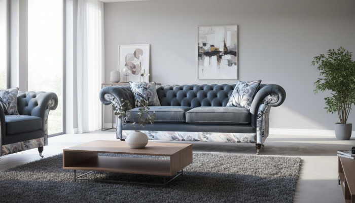 A striking three-seater sofa in Chesterfield design with delicate gray floral decoration.