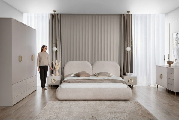 Beige bedroom set with double bed, wardrobe, dresser, 2x nightstands.