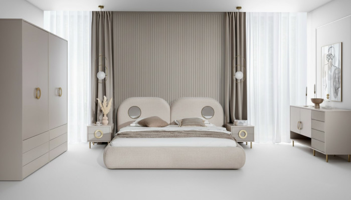 Beige bedroom set with double bed, wardrobe, dresser, 2x nightstands.