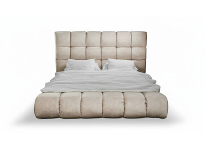 Luxury plush bed in the bedroom, large, handy designer bed, new interior.