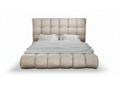 Luxury plush bed in the bedroom, large, handy designer bed, new interior.